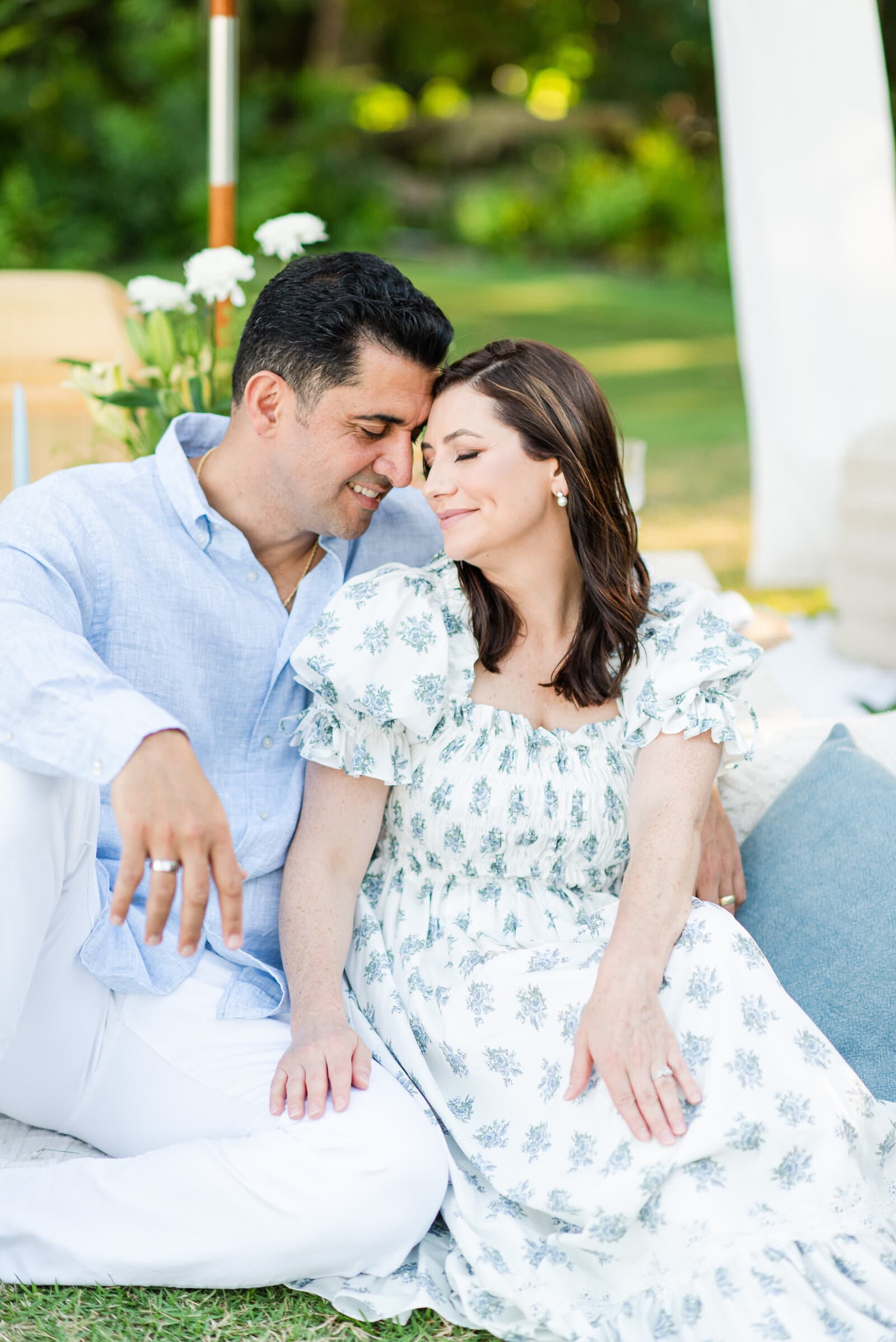 Couple sharing a quiet moment during the same outdoor family session