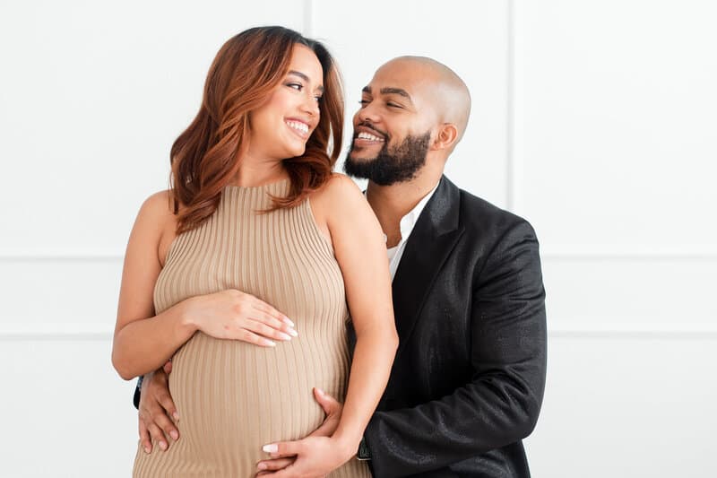 Family sharing a joyful moment during a South Florida portrait session