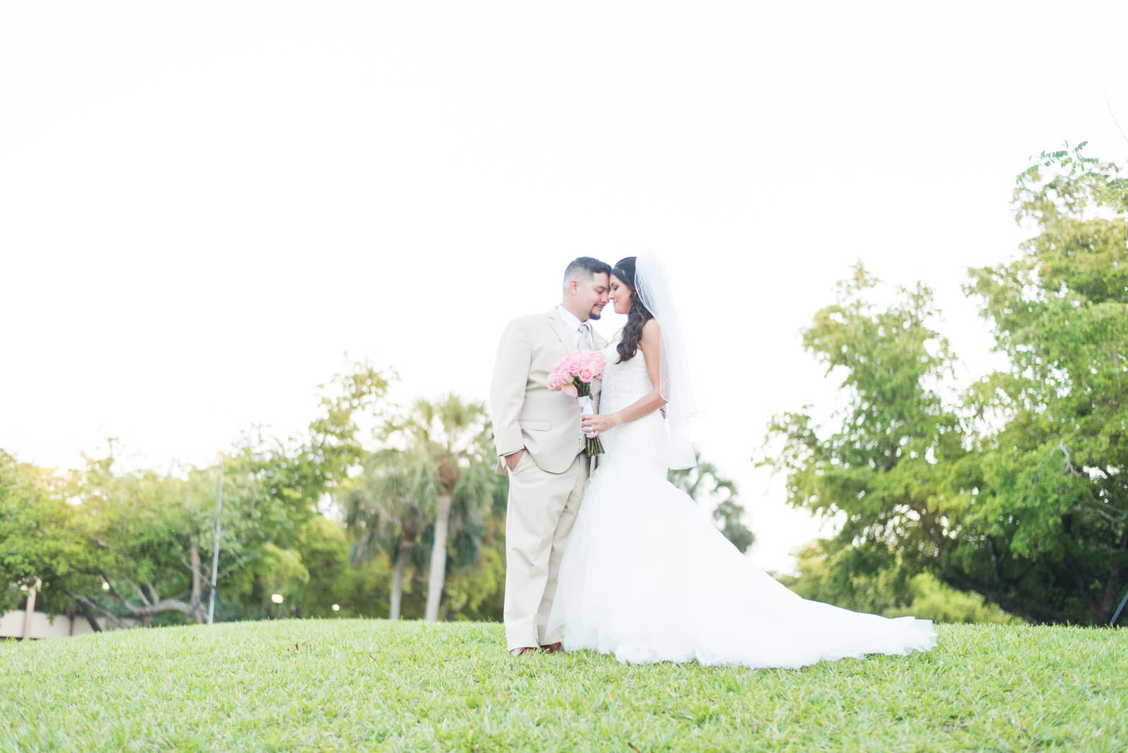 Wedding couple sharing a quiet portrait together